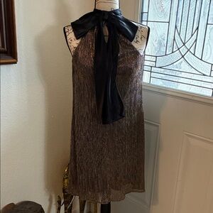 Elegant Metallic Halter Dress with Black Bow